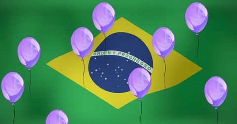 Purple balloons flying over brazil flag