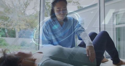 Nurse assessing patient using augmented reality interface for clinical evaluation
