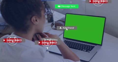 Woman resting chin watching laptop with green screen and social overlays, remote workspace
