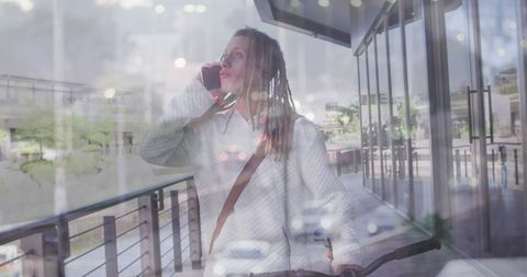 Biracial Man with Bike Talking on Smartphone Overlaid with Traffic