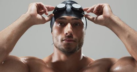 Focused Athlete Prepares for Competitive Swim