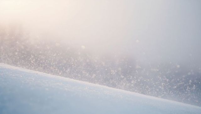 Sparkling Snow Drift Catching Hazy Sunrise Light with Airborne Crystals and Pastel Glow