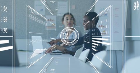 Diverse Business Team Analyzing Data with Digital Interface Hologram