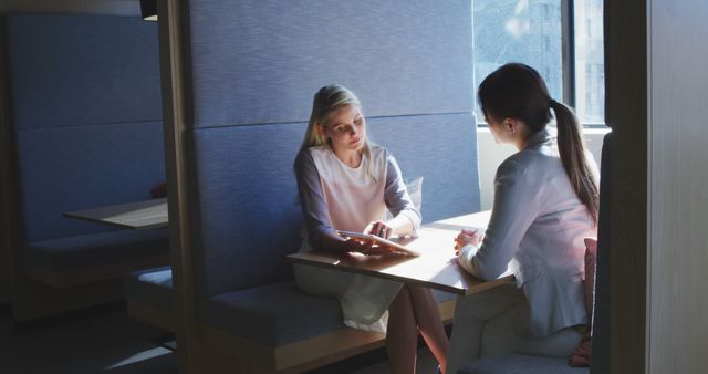 Two Women Having Business Meeting in Modern Cafe - Download Free Stock Images Pikwizard.com