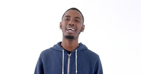 Confident Young Man Smiling in Blue Hoodie with White Background - Download Free Stock Images Pikwizard.com