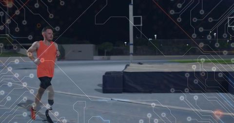 Paralympic athlete running with prosthetic leg at night