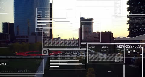 Futuristic Data Interface Overlaying Urban Skyline at Sunset