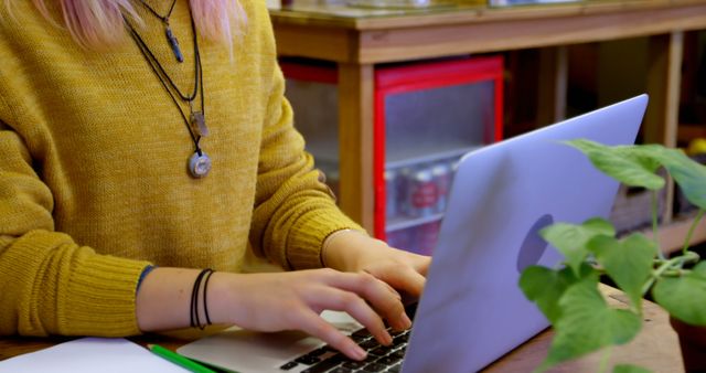 Young Woman Typing on Laptop in Cozy Environment - Download Free Stock Images Pikwizard.com