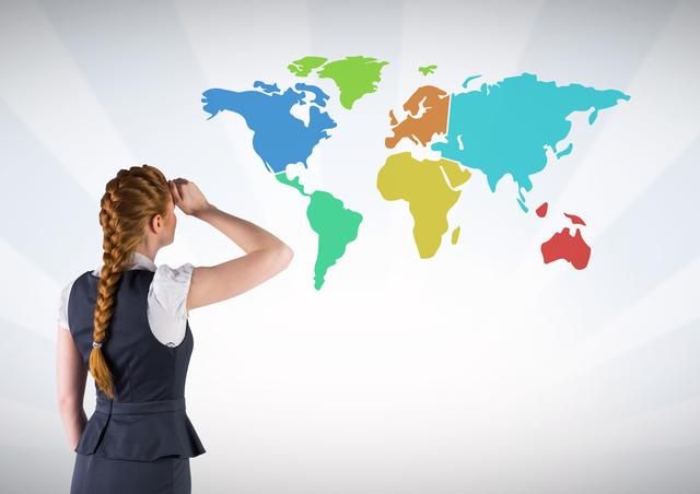Digital composite of Businesswoman looking at Colorful Map with wall background