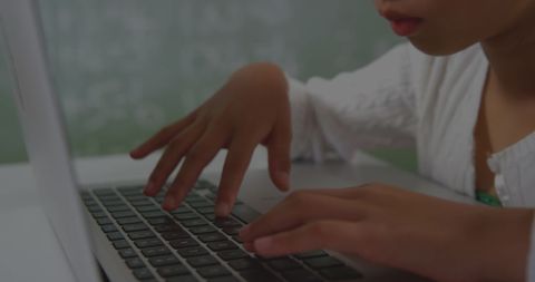 Asian Child Concentrated Using Laptop for e-Learning - Download Free Stock Images Pikwizard.com