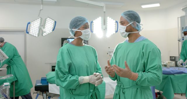 Surgeons Communicating in Operating Room during Surgery - Download Free Stock Images Pikwizard.com