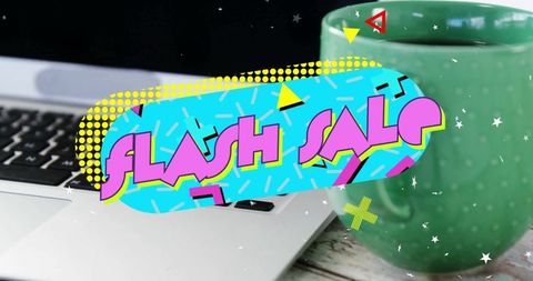 Colorful Flash Sale Sign with Laptop and Coffee Mug