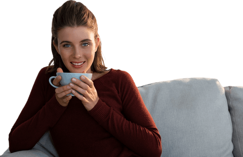Smiling Woman Drinking Coffee on Couch Transparent Background