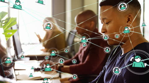 Diverse Professionals Working Amidst Network Graphics