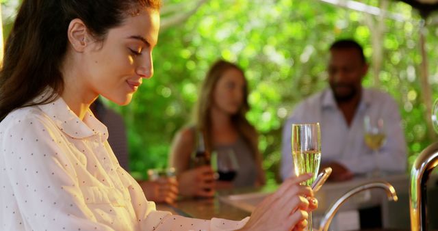 Woman Enjoying Drink in Outdoor Cafe - Download Free Stock Images Pikwizard.com