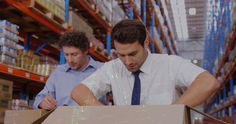 Warehouse Workers Collaborating with Digital Interface - Download Free Stock Images Pikwizard.com