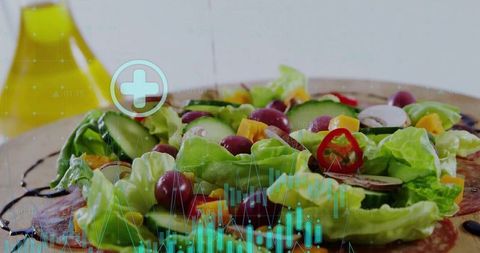 Serving butter lettuce salad with cucumbers, olives and balsamic, digital data overlay