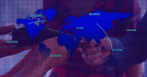 Hands holding smartphone pointing at screen with blue world map overlay and data analytics