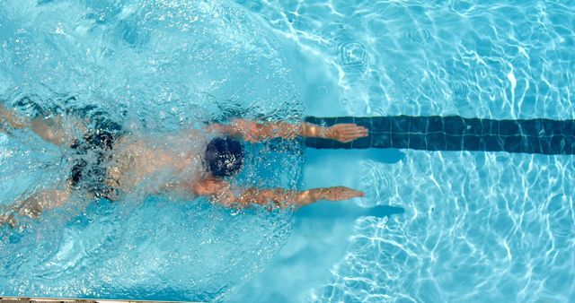 Swimmer Gliding Underwater in Pool Doing Breaststroke - Download Free Stock Images Pikwizard.com