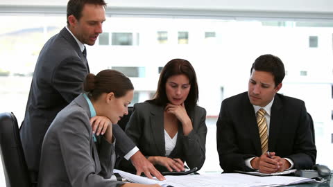 Team of Architects Collaborating on Project Development