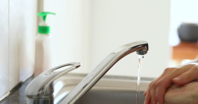 Person Washing Hands Under Running Tap Water for Hygiene - Download Free Stock Images Pikwizard.com