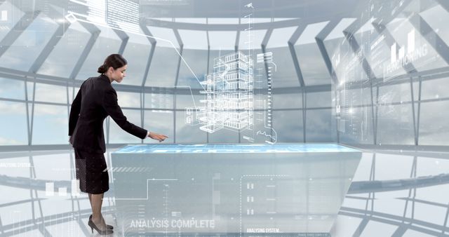 Businesswoman Interacting with Virtual Holographic Interface in Modern Office - Download Free Stock Images Pikwizard.com