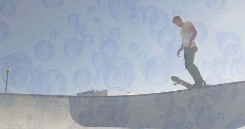 Skateboarder Balancing on Edge with Digital Bubbles Overlay