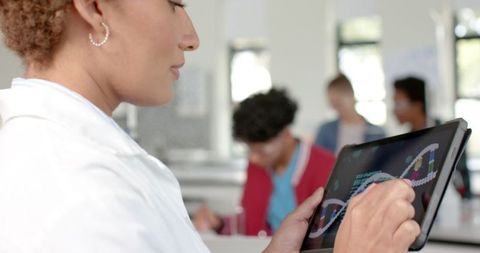 High School Student Studying DNA Structure on Tablet