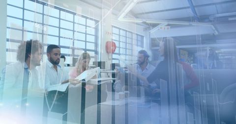 Collaborative office team working on financial data analysis