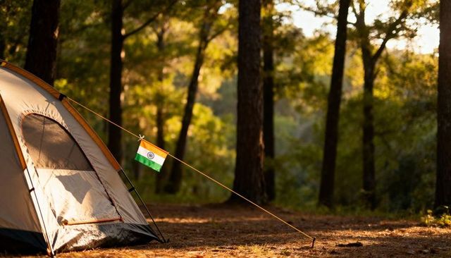 Indian flag flying on tent guyline at sunlit pine forest campsite with warm golden light