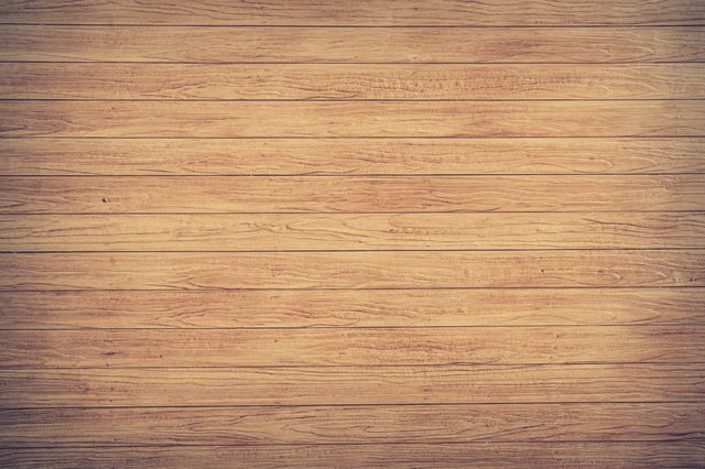 This image shows a seamless pattern of wooden planks with a natural grain texture. It is ideal for use as a background in design projects such as websites, packaging, presentations, or interior design layouts. It conveys a rustic and natural aesthetic.