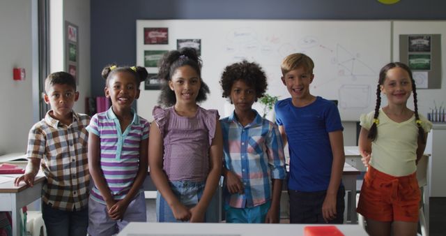 Diverse Group of Children Smiling in Classroom Setting - Download Free Stock Images Pikwizard.com