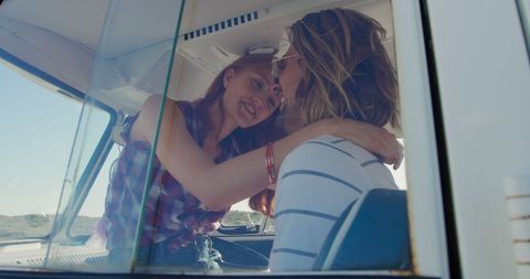 Caucasian Couple Sharing Intimate Moment in Vehicle Interior - Download Free Stock Images Pikwizard.com