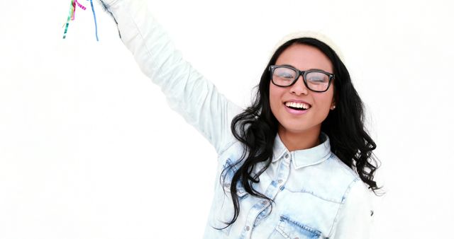 Smiling Woman with Casual Outfit and Beanie Holding Colorful Bracelets - Download Free Stock Images Pikwizard.com