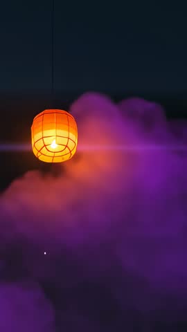 Floating Orange Paper Lantern Drifting Through Purple Cloud Vertical Video with Lens Flare
