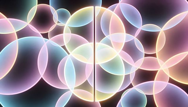 Glowing translucent neon circles overlapping on dark background with central divider