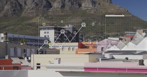 Pastel Rooftops with Digital Data Overlay Against Mountain Backdrop