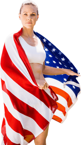 woman wrapped in united states flag exuding professionalism with confident pose. useful for promotions related to sports events prioritizing national pride or personal strength. perfect for editorial use in magazines with themes of athleticism and patriotism among women.