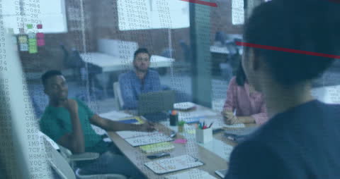 Diverse Team Planning Growth Strategy with Digital Interface