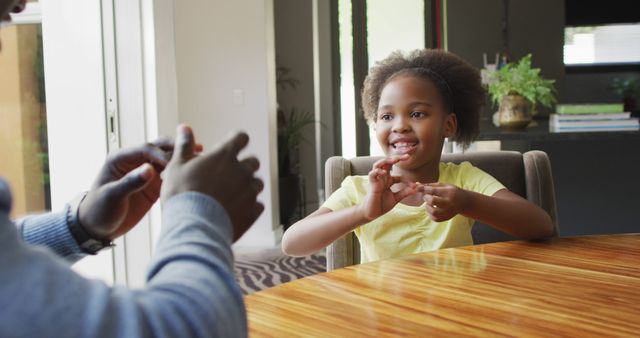 Happy African American Child Learning Sign Language at Home - Download Free Stock Images Pikwizard.com