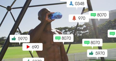Athlete Engaging with Social Media While Hydrating
