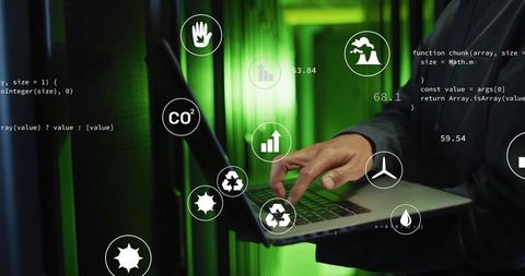 Tech professional analyzing data with eco icons in data center