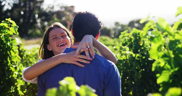 Happy Couple Embracing in a Green Vineyard - Download Free Stock Images Pikwizard.com