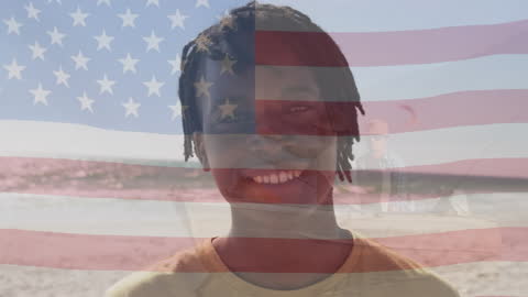 Smiling Young Man Double Exposure with American Flag