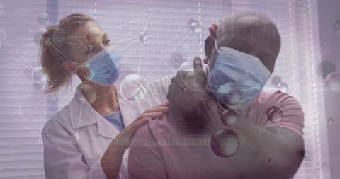 Clinician reassuring masked patient during neck examination in clinic with network overlay