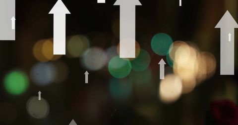 Abstract arrows symbolizing growth and progress on blurry urban background