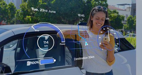 Woman Engaging with Futuristic Car Digital Dashboard Interface