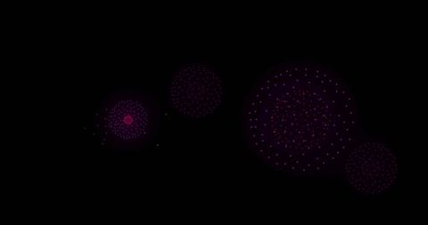 Colorful Glowing Particles on Black Background for Celebrations