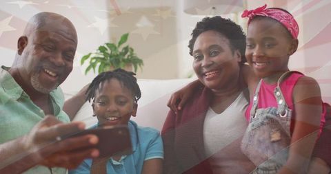 Happy Family Bonding Over Smart Phone