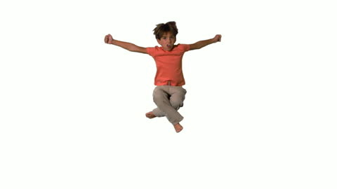 Boy Jumping and Celebrating in Full Motion on Plain Background